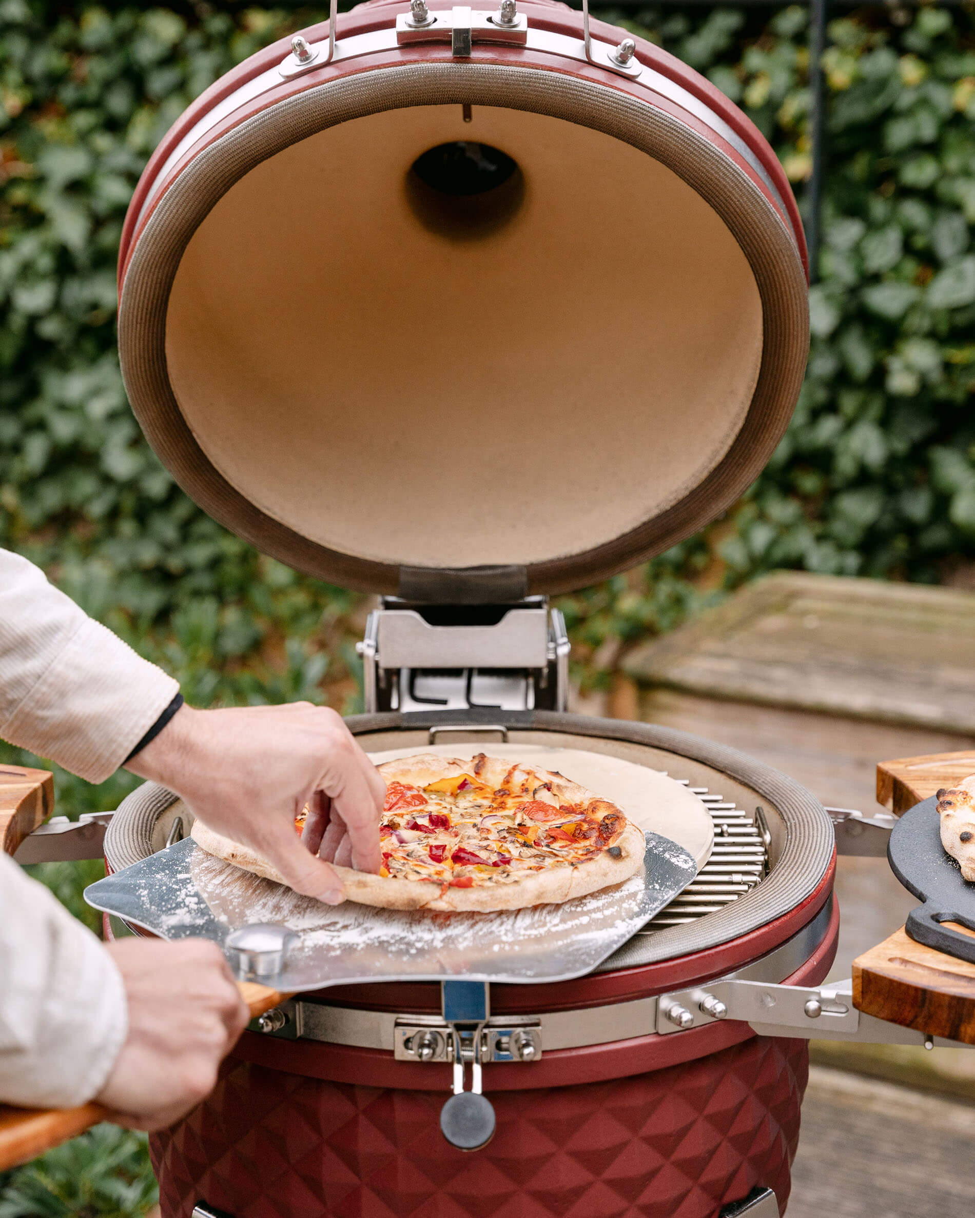 Pá de pizza em inox e pizzas