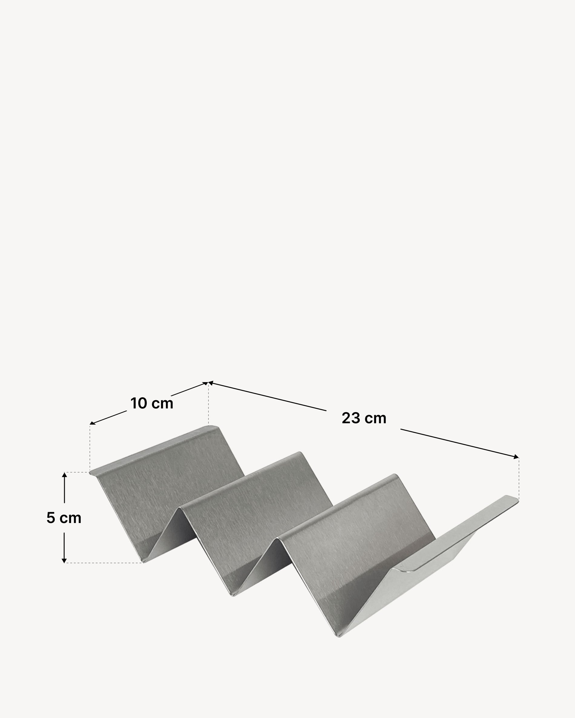 Suporte para tacos em aço inoxidável com estrutura dobrada em ziguezague, composto por vários espaços para tortilhas, apresentado com um esquema de dimensões que indica um comprimento total de 23 cm, uma largura de 10 cm e uma altura de 5 cm.